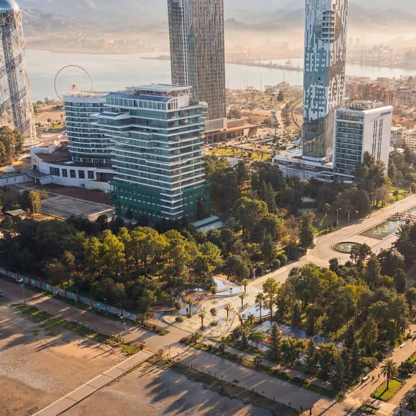 Aerial view of the Old Boulevard entrance toward the sea and city skyline